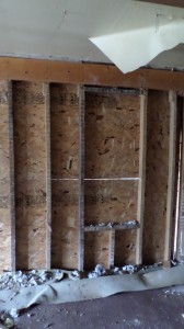 Reconstructed wall where the opening to te converted porch used to be.